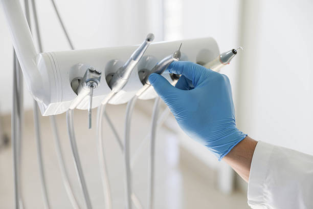Professional Emergency Dentist technician working in North Falmouth, MA